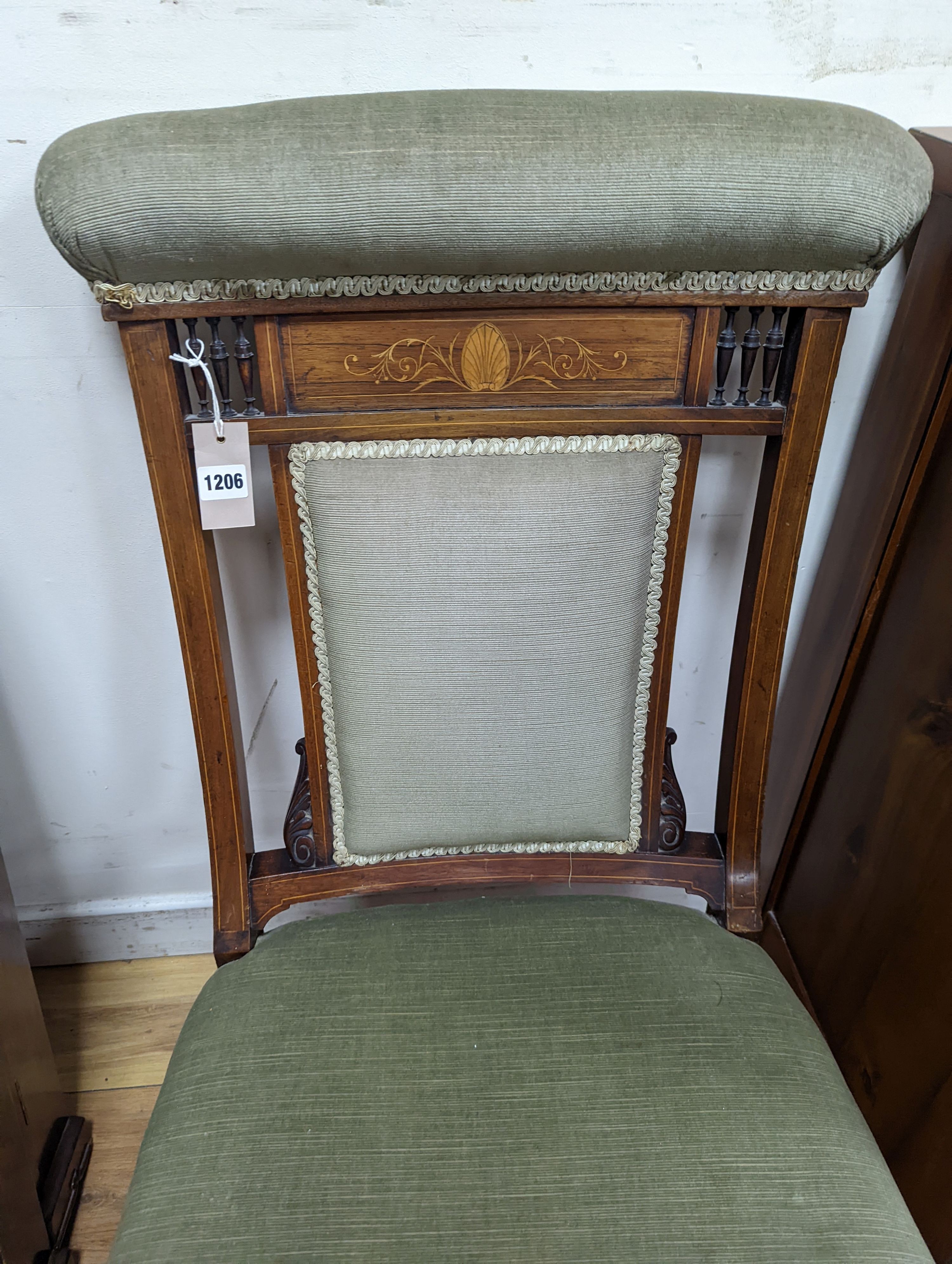 A late Victorian marquetry inlaid mahogany nursing chair